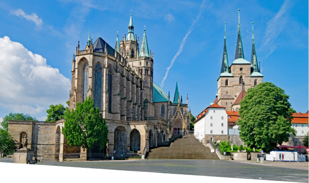 A cityscape of Erfurt, a major logistics hub for modern warehouses and storage facilities, featuring the historic Erfurt Cathedral. A cityscape of Erfurt, a major logistics hub for modern warehouses and storage facilities, featuring the historic Erfurt Cathedral.