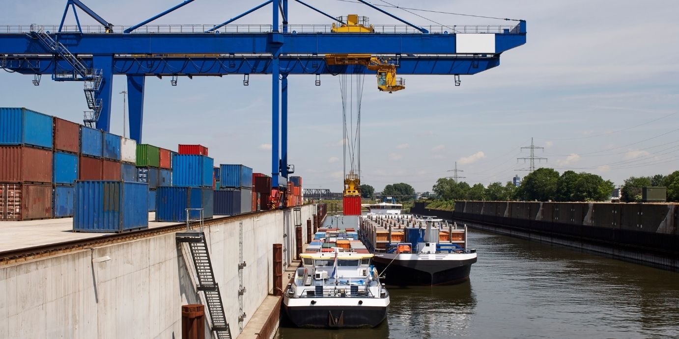 Container handling at the KombiTerminal Rheine in the freight transport centre with trimodal connections by rail, road and water.